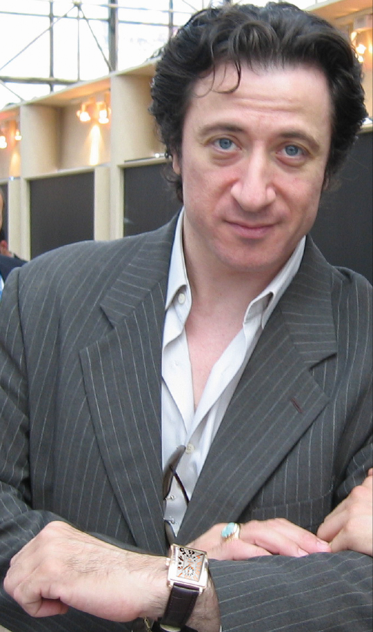 Federico Castelluccio Wearing an 18K Rose Gold Gevril 5120 Avenue of Americas GMT Power Reserve Watch